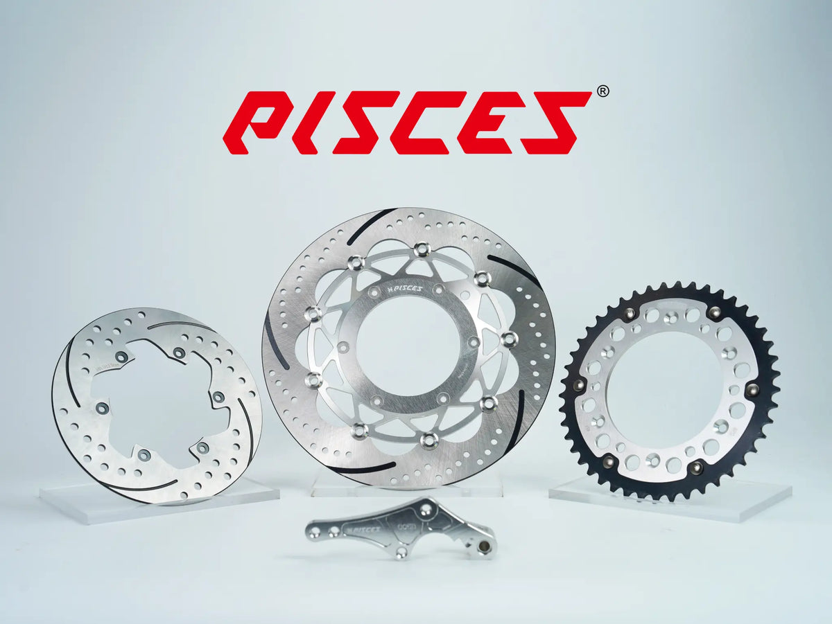 Pisces custom supermoto brake kit 320mm in silver, including silver front brake disc, silver rear brake disc, silver sprocket and silver offset bracket.